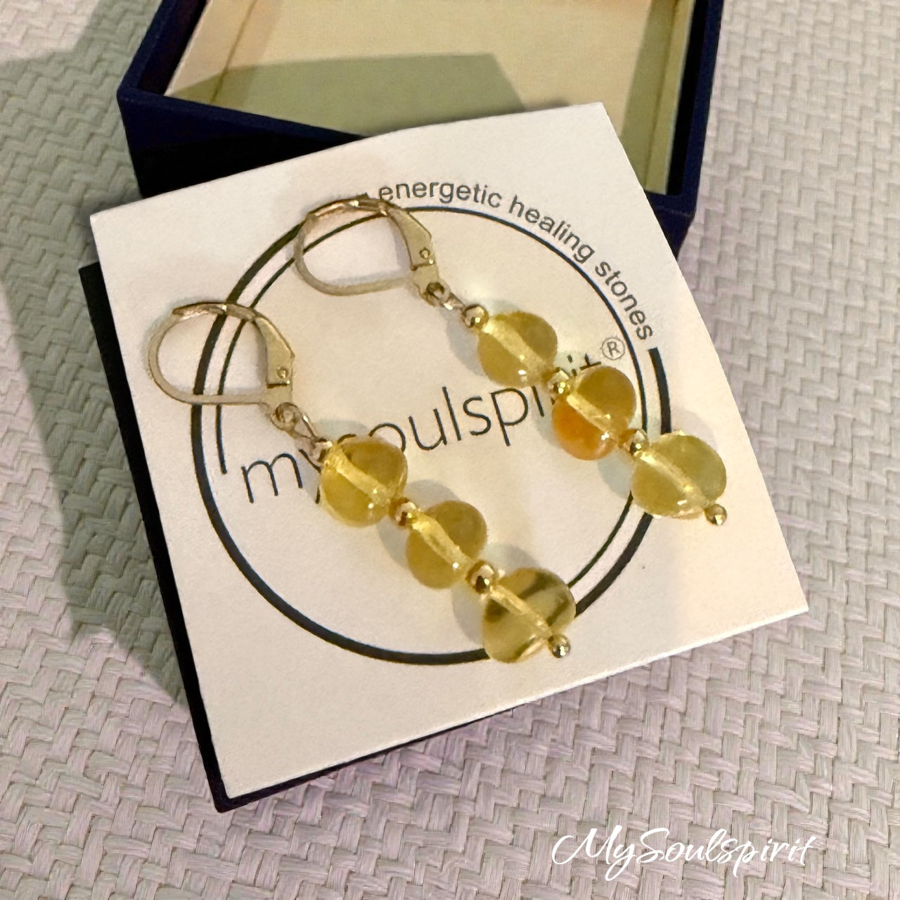 Bernstein Ohrhänger mit 3 Perlen